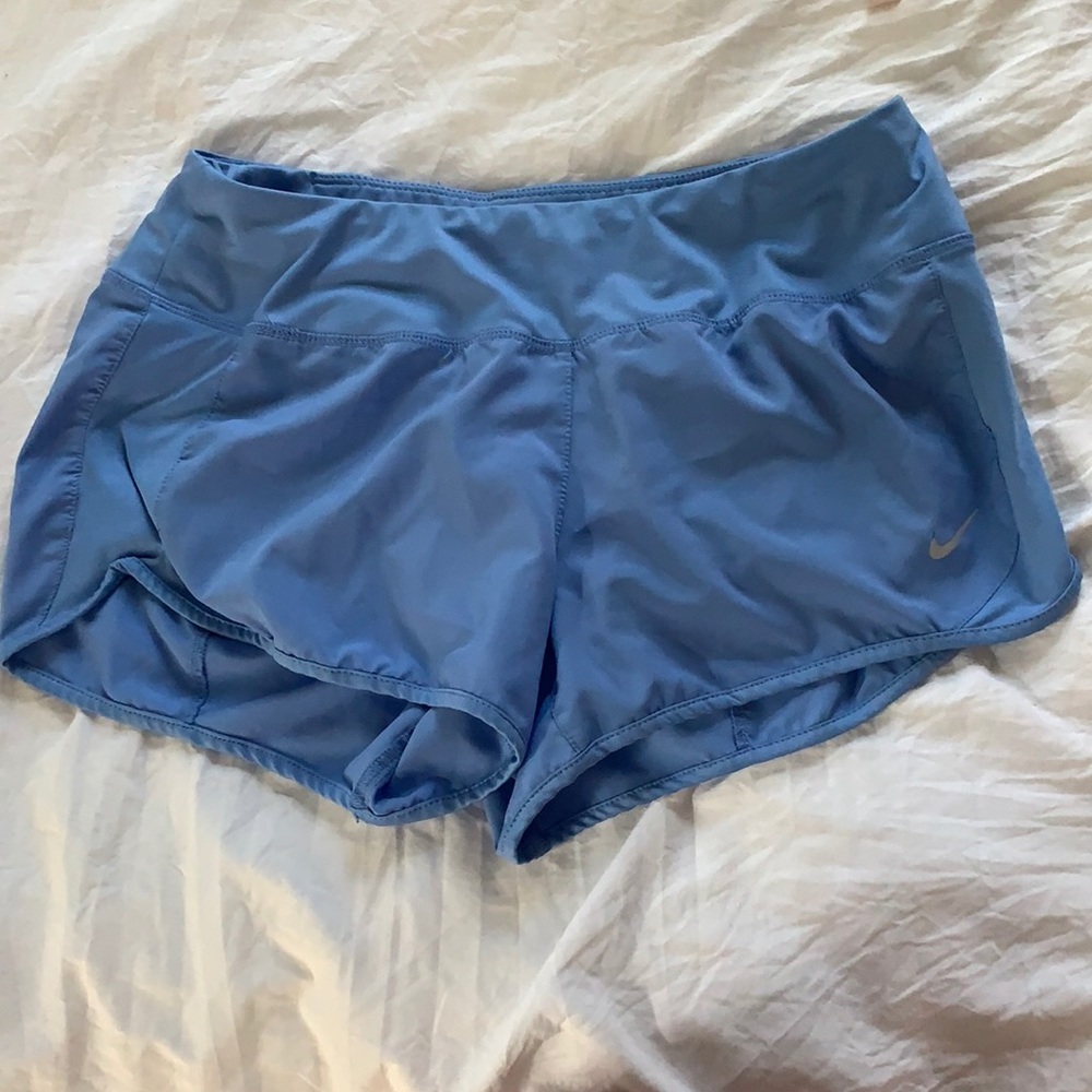 Blue Nike dry fit running shorts